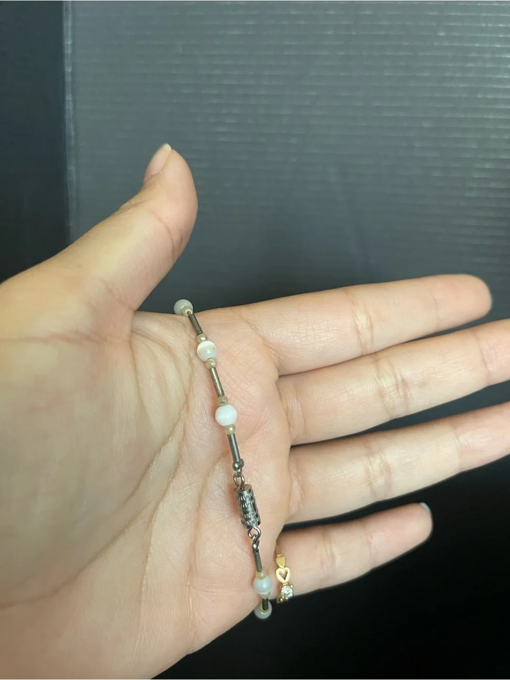 Silver tone bar and bead cat eye stone bracelet